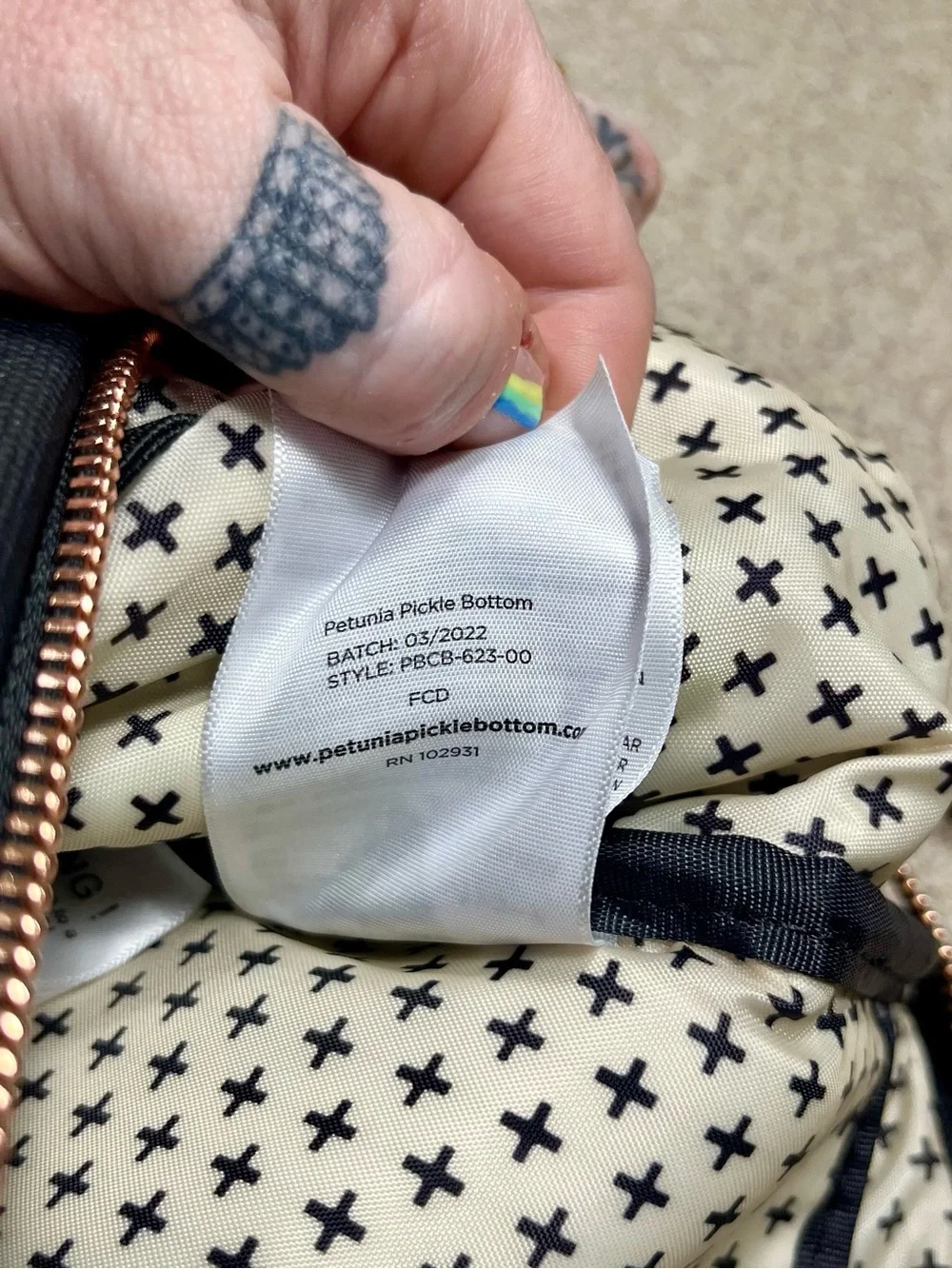 Petunia Pickle Bottom Cream and Black Cross-Print Bag with Rose Gold Hardware